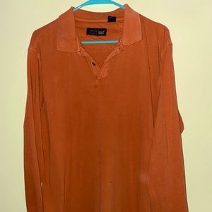 Orange long sleeved shirt